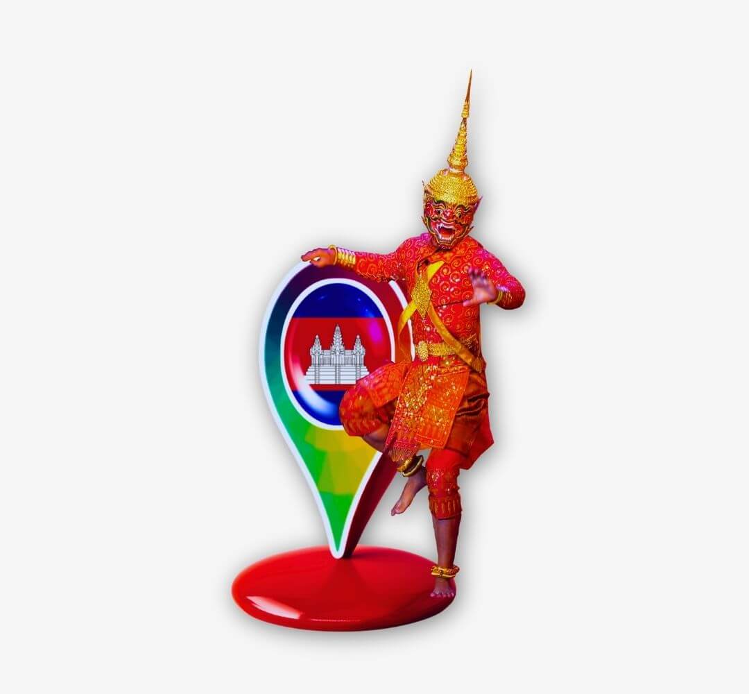 A character from a Traditional Khmer show with a geographic pin welcomes tourists to Cambodia.