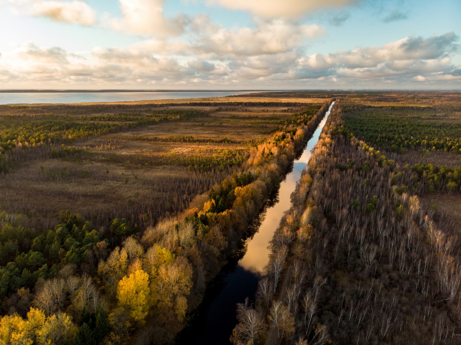 Beautiful autumn aerial view of King Wilhelm’s Channel, that connects the river Minija and the Curonian Lagoon.