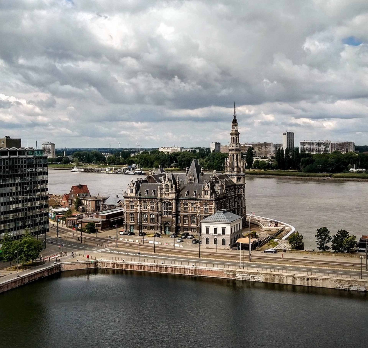 The view from the rooftop of the MAS museum in Antwerp towards the Schelde river, with the 19th Century loodswezen (pilots) building in the foreground.