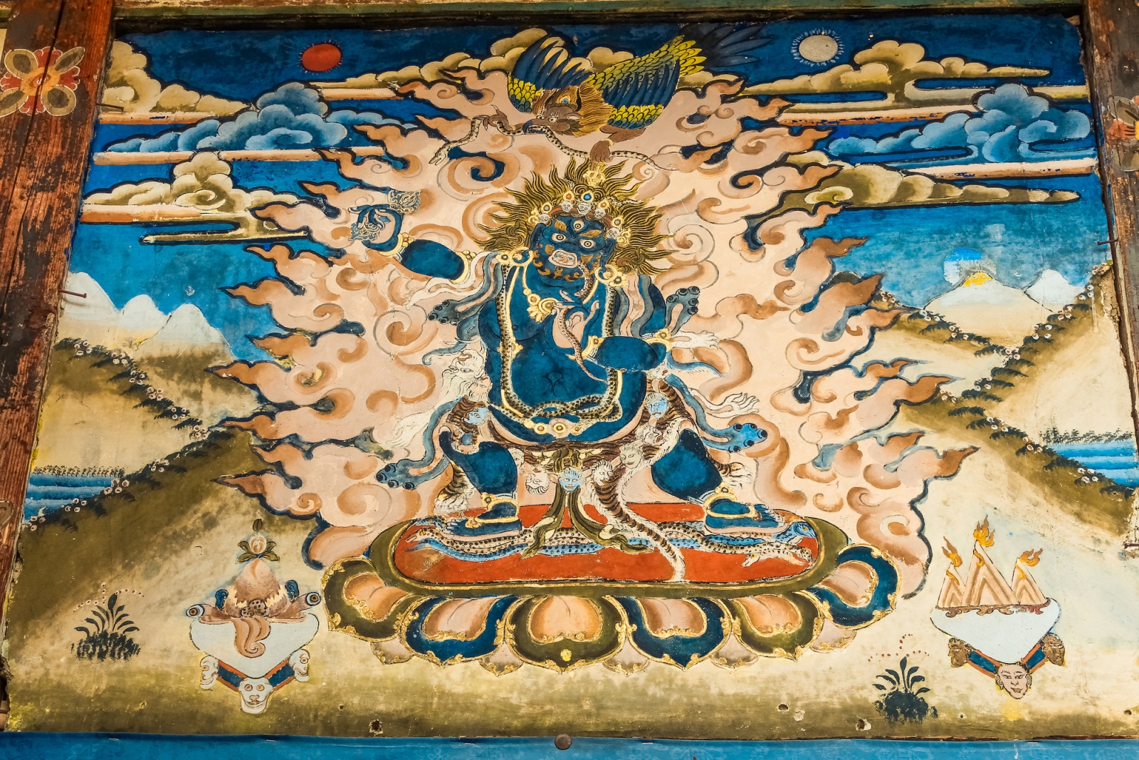 Wrathful dark blue Bodhisattva Vajrapani on Tibetan tangka painting in a temple in Bumthang in Bhutan