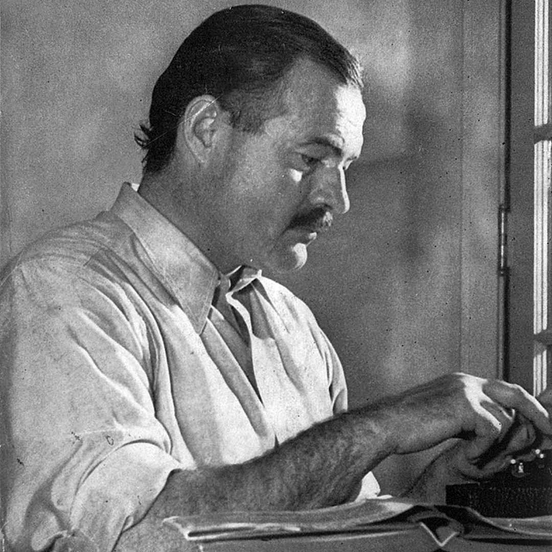 Hemingway at work in his home