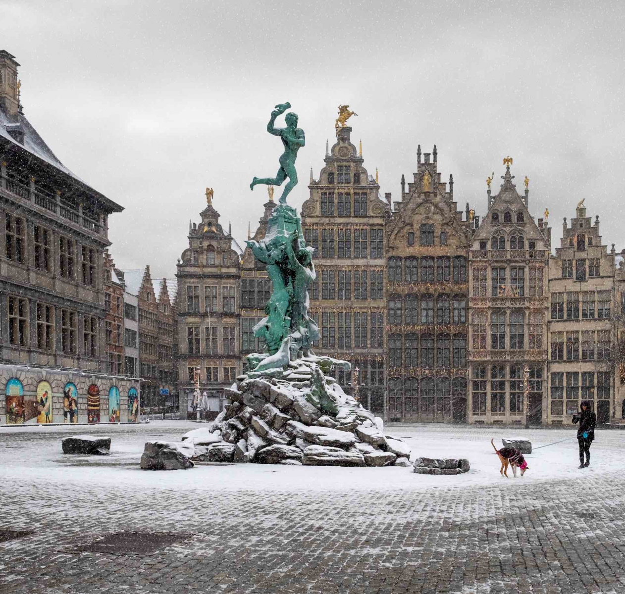The "Grote Markt" square in the city of Antwerp, covered in snow