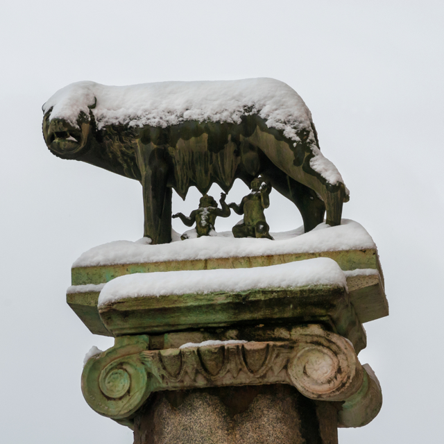Legendary Capitoline Wolf with royal twins, symbol of the city, at the top of Capitol Hill, covered with snow 