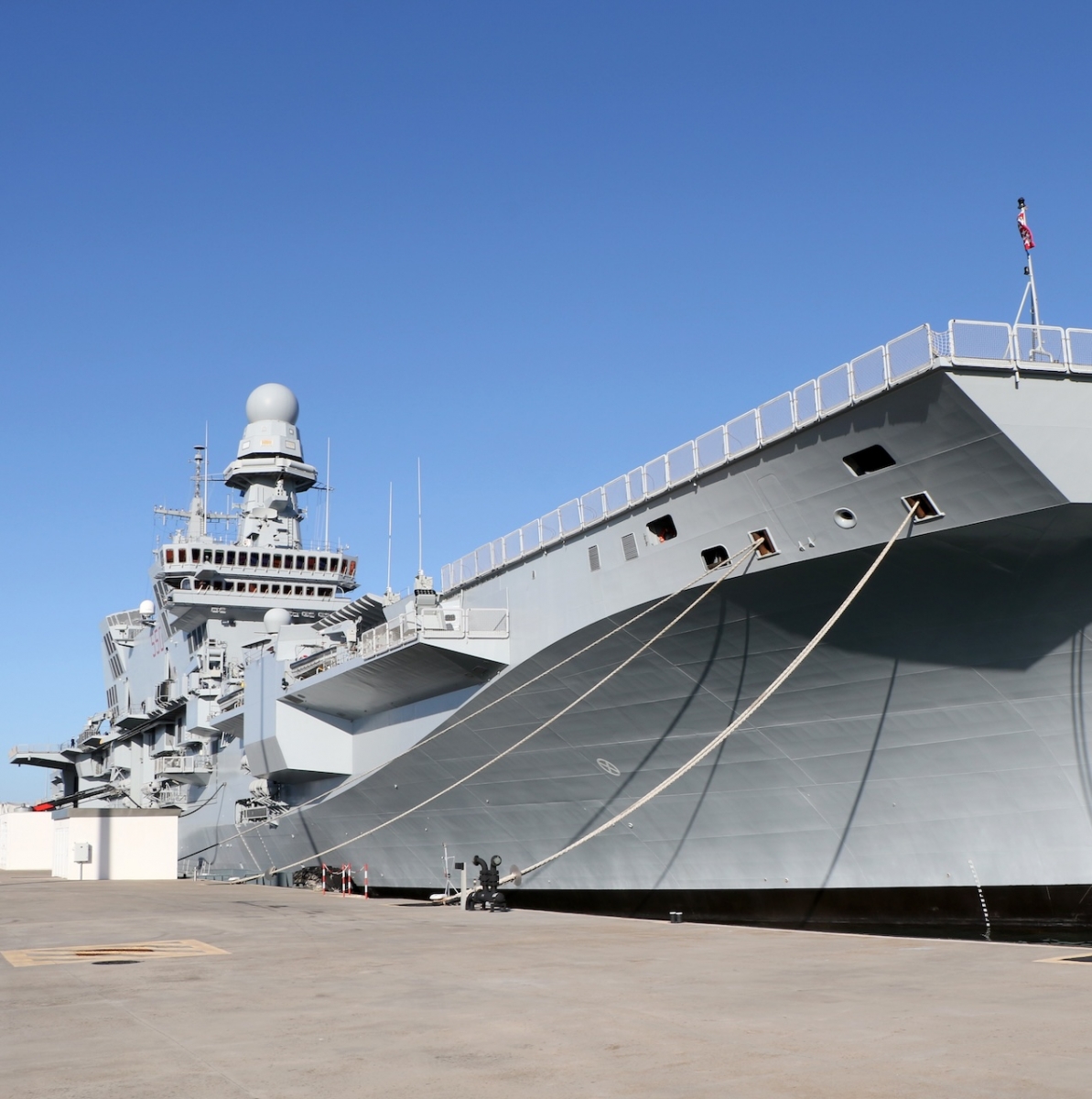 aircraft carrier ship Cavour moored at the military naval base