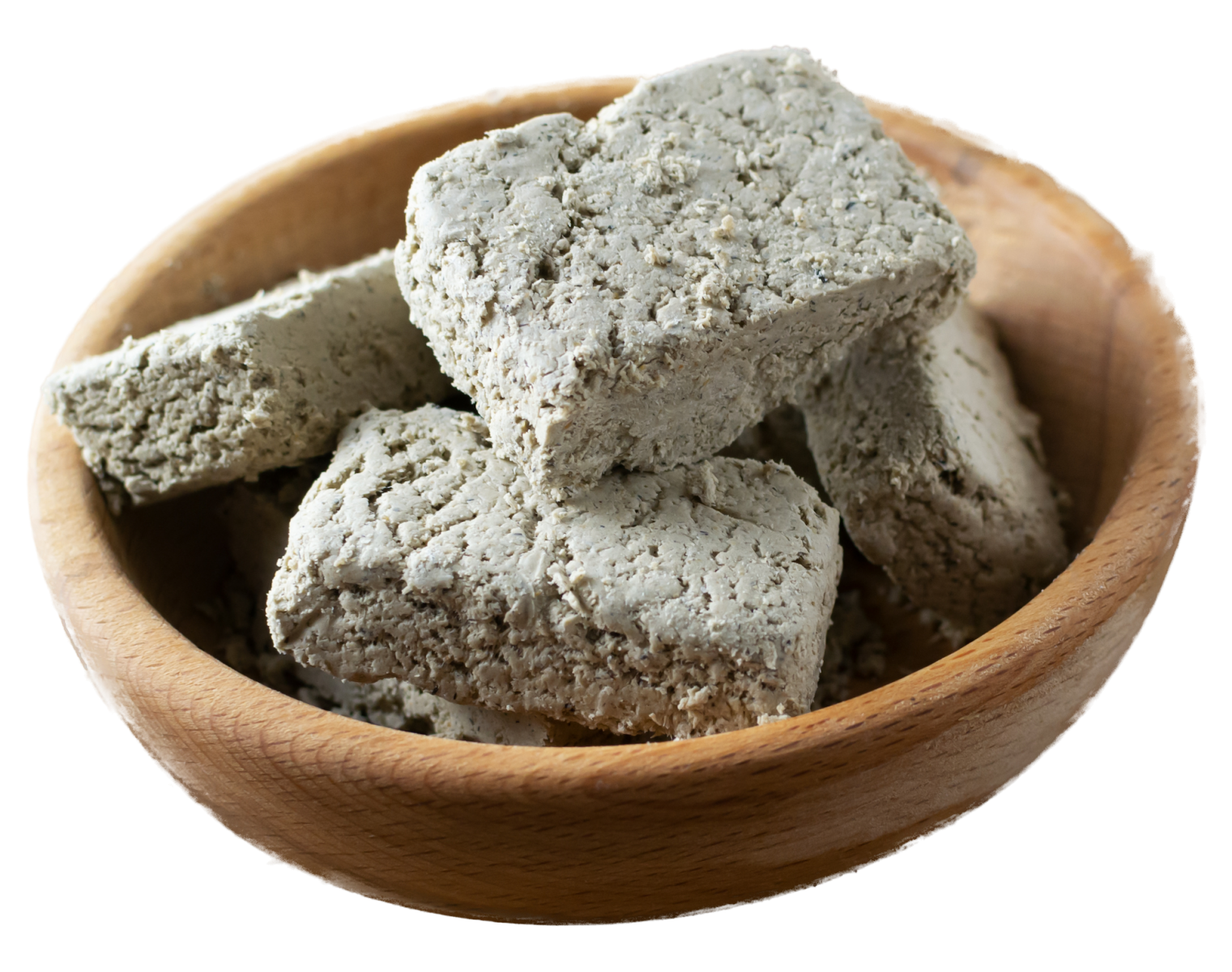 Sunflower greek halva in a wooden bowl on a wooden table. Rustic style. Traditional sweets