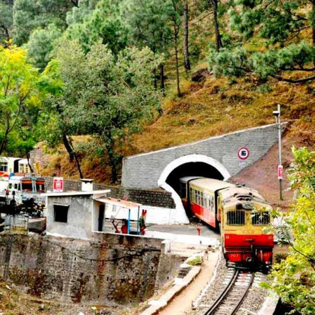 The Himalayan Queen Train enters the tunnel